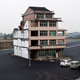 Image for article titled Unbelievable “nail houses” around the world